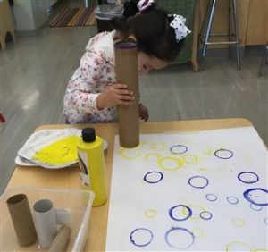 Girl drawing circles