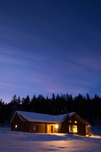 The dining lodge glows invitingly pre-dawn.