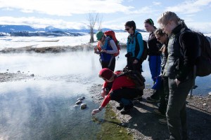 Noel takes the temperature of the Kelly Hot Spring.