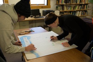 …and prepares for their presentation.