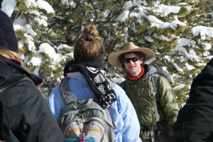 Ben tells the students about a Lodge Pole Pine adaptation to resist fires -- serotinous cones.