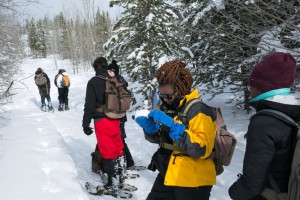 The surface of the snow has cool crystalline formations that Mary Grace is taking a closer look at.