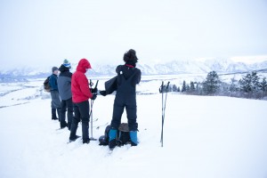 Josh layers up against the icy wind.