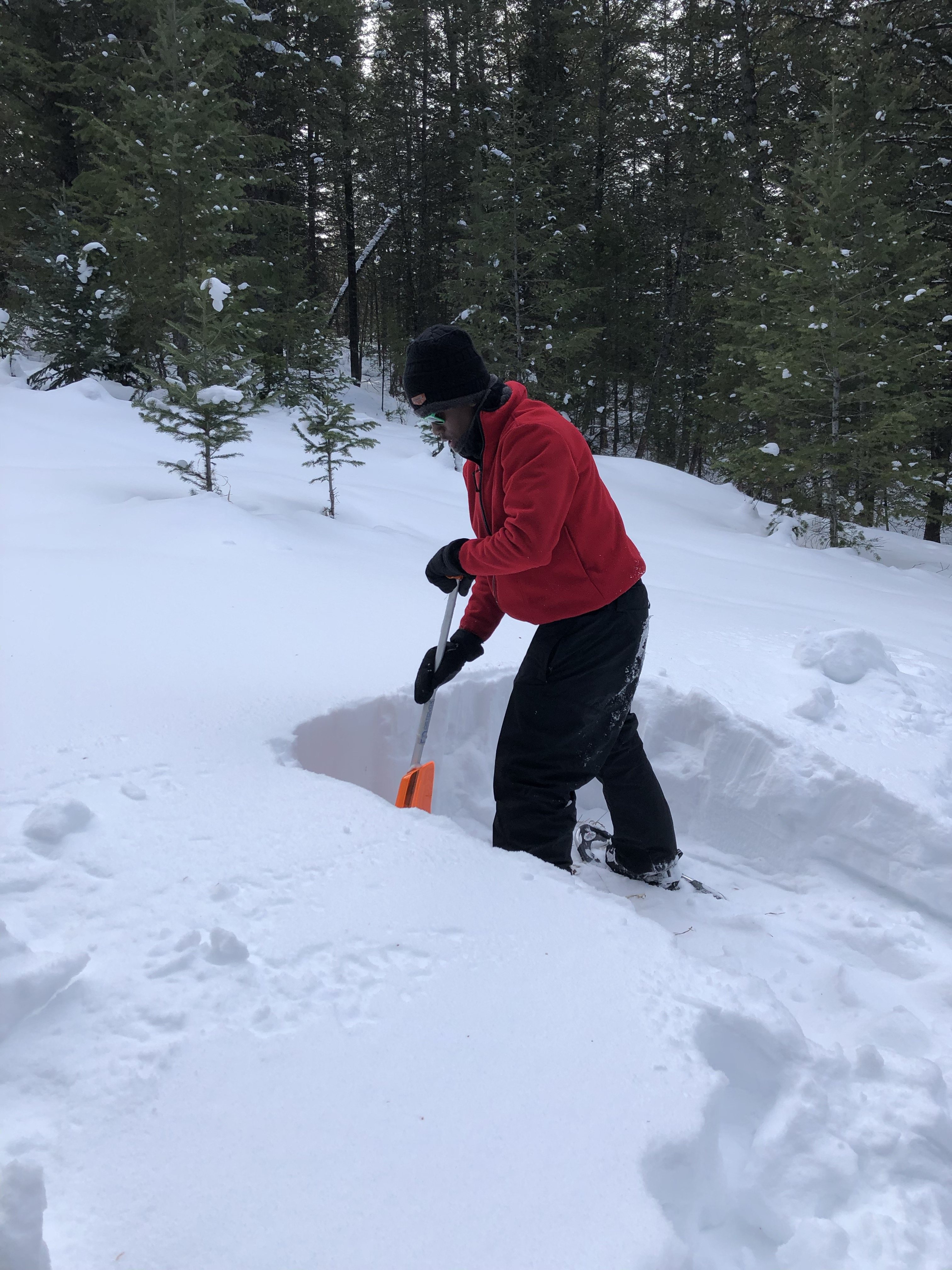 Jay digs a snow pit
