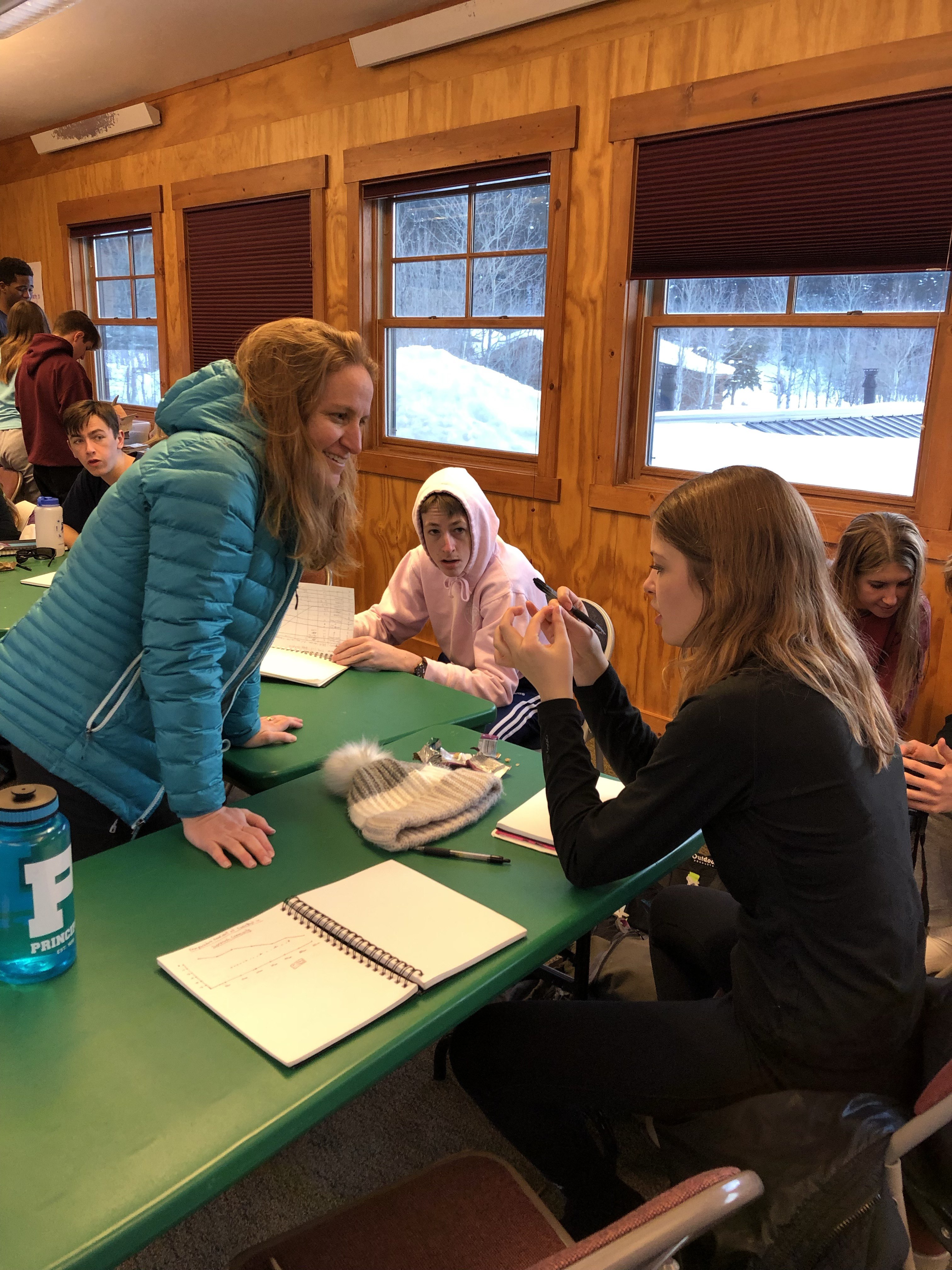 Lynne Scott discussing research with Emmi