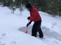 Jay digs a snow pit